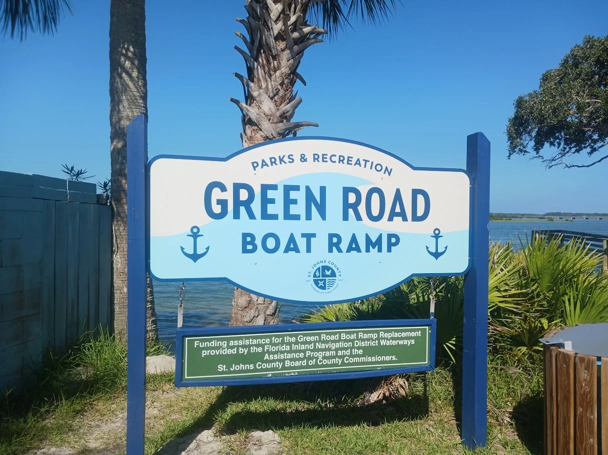 sign at green road fishing pier